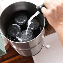 The Alexapure Pro being filled with water